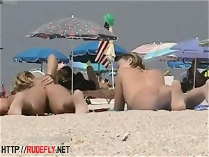 light-haired model naturist on the naked beach hidden cam movie
